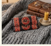 Rhinoceros Motif Tooled Leather Wallet